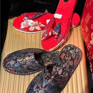 2 pair of Fabric Slip-ons. Red has terry cloth cushioned base. Man-made soles.